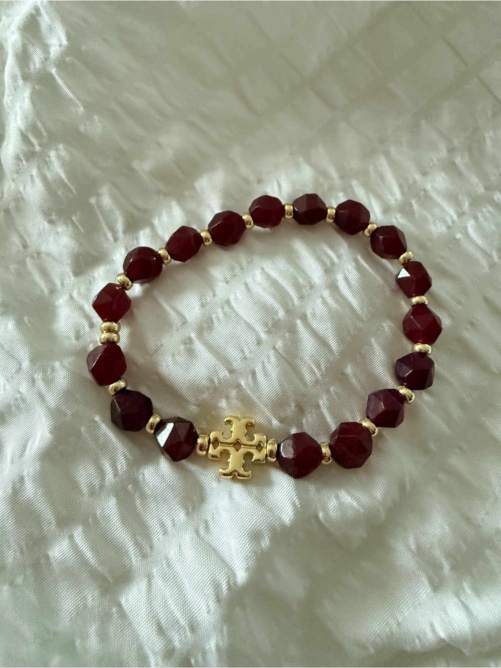 Tory Burch Burgundy Faceted Bead Bracelet with Gold Logo